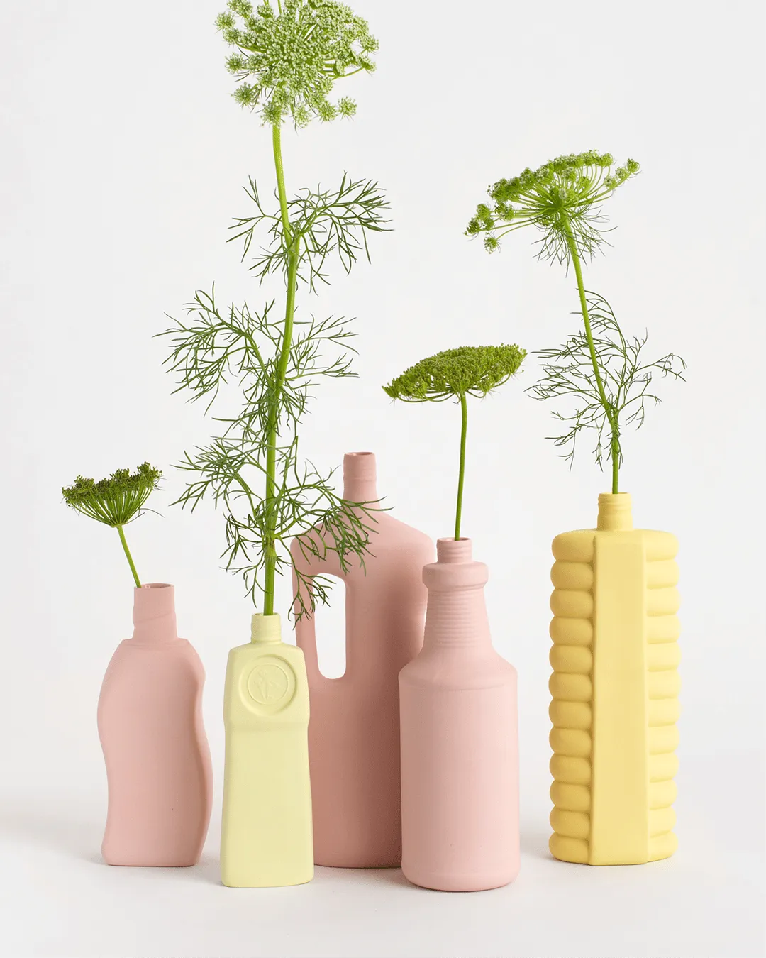 Vases bouteille en porcelaine colorés